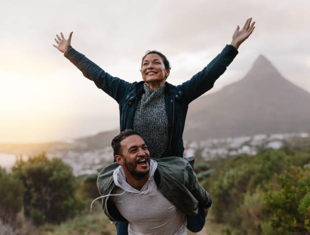 istock Young couple enjoying themselves in countryside 687163118