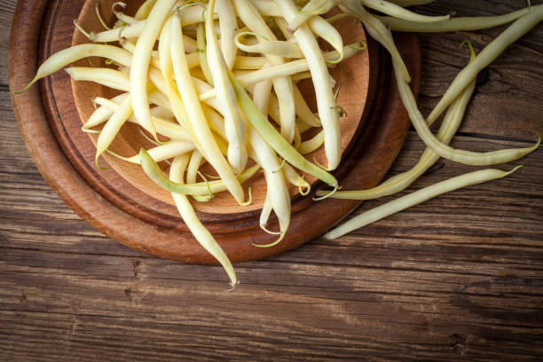 istock Yellow kidney beans in a bowl. 687184774