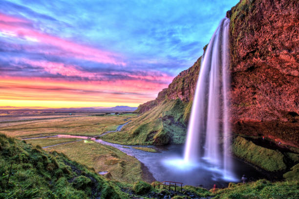 istock Seljalandfoss Waterfall at Sunset, Iceland 687197114