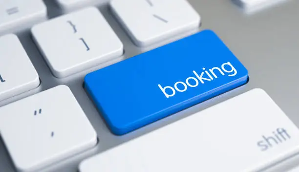 Photo of Booking - Caption on Blue Keyboard Button. 3D