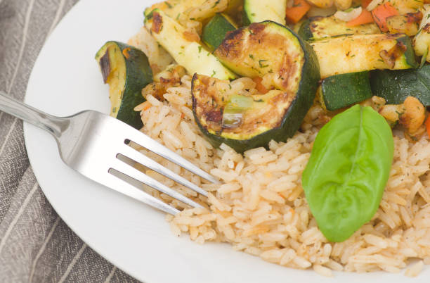istock Risotto with grilled zucchini and vegetables. 687199548