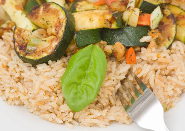istock Risotto with grilled zucchini and vegetables. 687199624