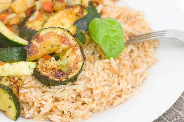 istock Risotto with grilled zucchini and vegetables. 687199760