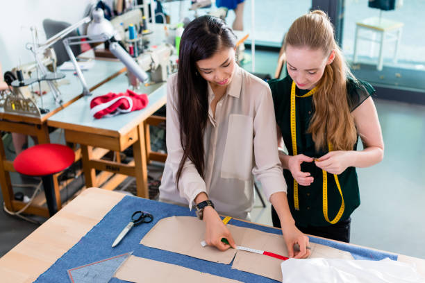 Young fashion designers talking about layout