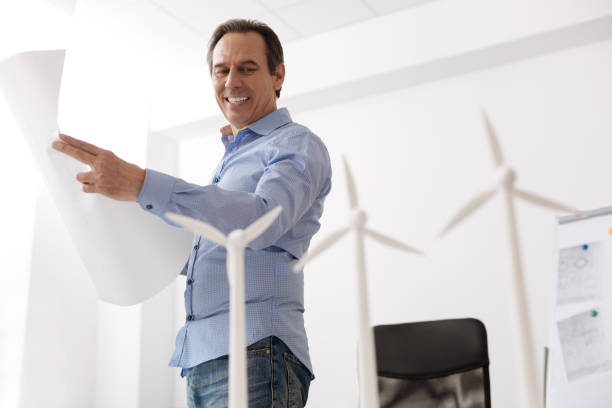 istock Joyful senior engineer bein involved in eco prject 687239206