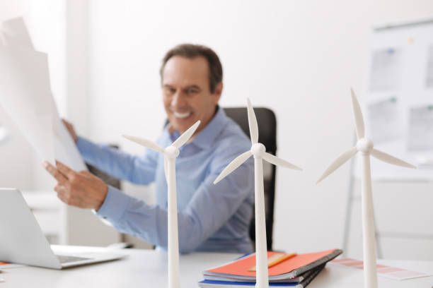 istock Senior engineer working on building wund turbines 687239316