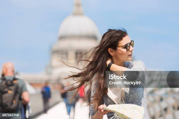 Travelblogger In London On Millennium Bridge Uk Stock Photo - Download Image Now - Adult, Adults Only, Architecture