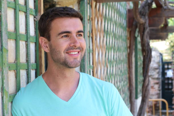 istock Cute man smiling at his countryside home 687273310