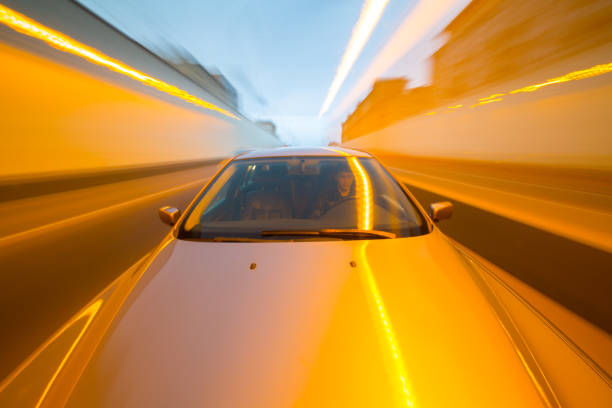istock Front view of black car with heavy blurred motion. 687286206