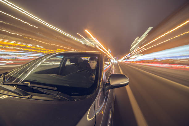 istock night city drive by car 687305890
