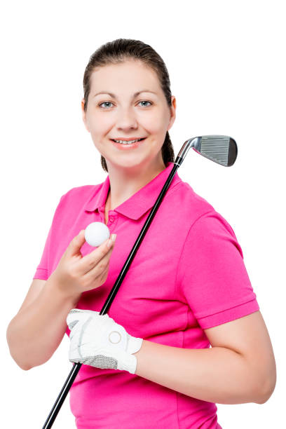 счастливая девушка вентилятор играть в гольф, портрет на белом фоне в студии - golf women pink ball стоковые фото и изображения