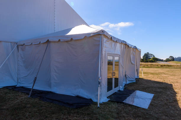 istock Large white tent for entertaining in field 687325584