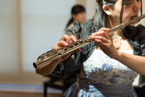 istock Flutist and Pianist playing music 687335690