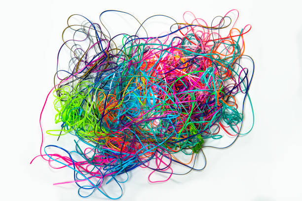 Tangled Lanyard Strings A wad of colorful tangled lanyard strings. tangled photos stock pictures, royalty-free photos & images
