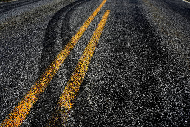 Crossing the Double Yellow!! The evidence left  after the auto accident. road accident stock pictures, royalty-free photos & images