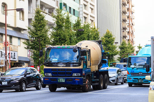 Tokyo, Japan - October 19, 2016: concrete mixer truck transporting in Shinagawa District, Tokyo.
