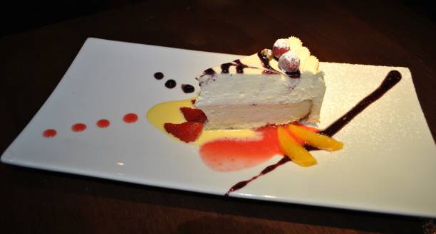 istock cheesecake with grapes, strawberries and peaches 687351624