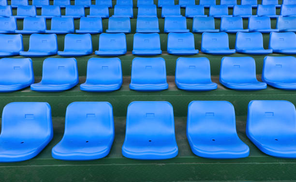 istock lines of blue stadium seats horizontal composition 687356858