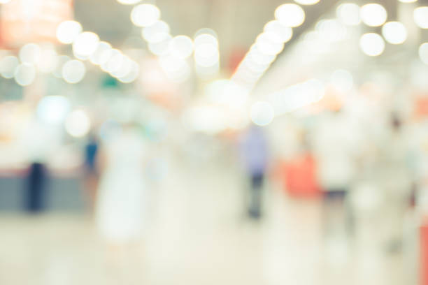 blurred background ,customer shopping at supermarket store with bokeh light - light shop imagens e fotografias de stock