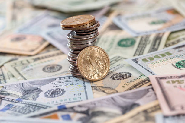 istock us coin abobe dollar banknote. close up 687410212