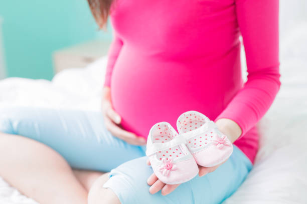 istock beauty pregnancy woman 687414616
