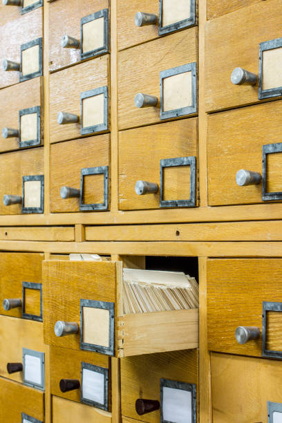istock Old wooden card catalogue in library 687418592