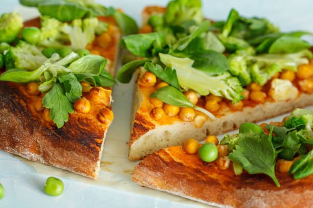 istock Vegan pizza with chickpeas and broccoli. 687421700