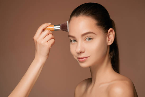 istock Beautiful female eyes with make-up and brush 687429958