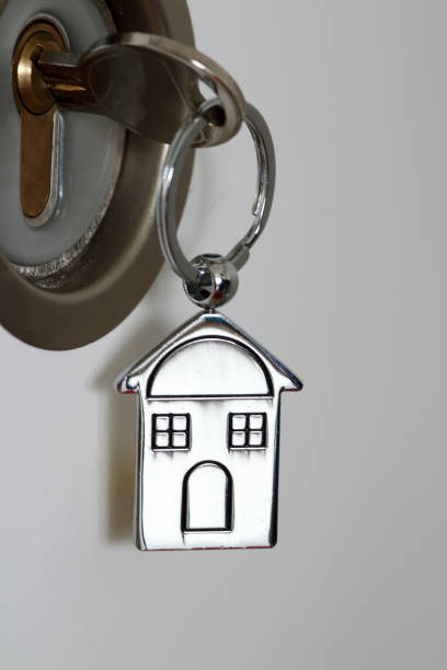 istock House key in a lock with house icon on it 687430076