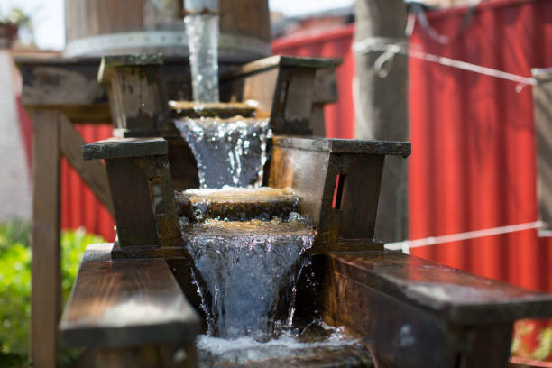 istock Waterfall. Water Fountain with Nice Wood Frame. Water Spout. 687433182