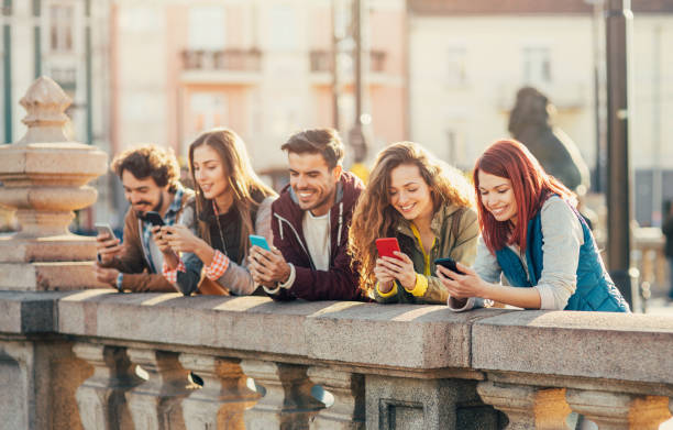 istock People texting in the city 687434856