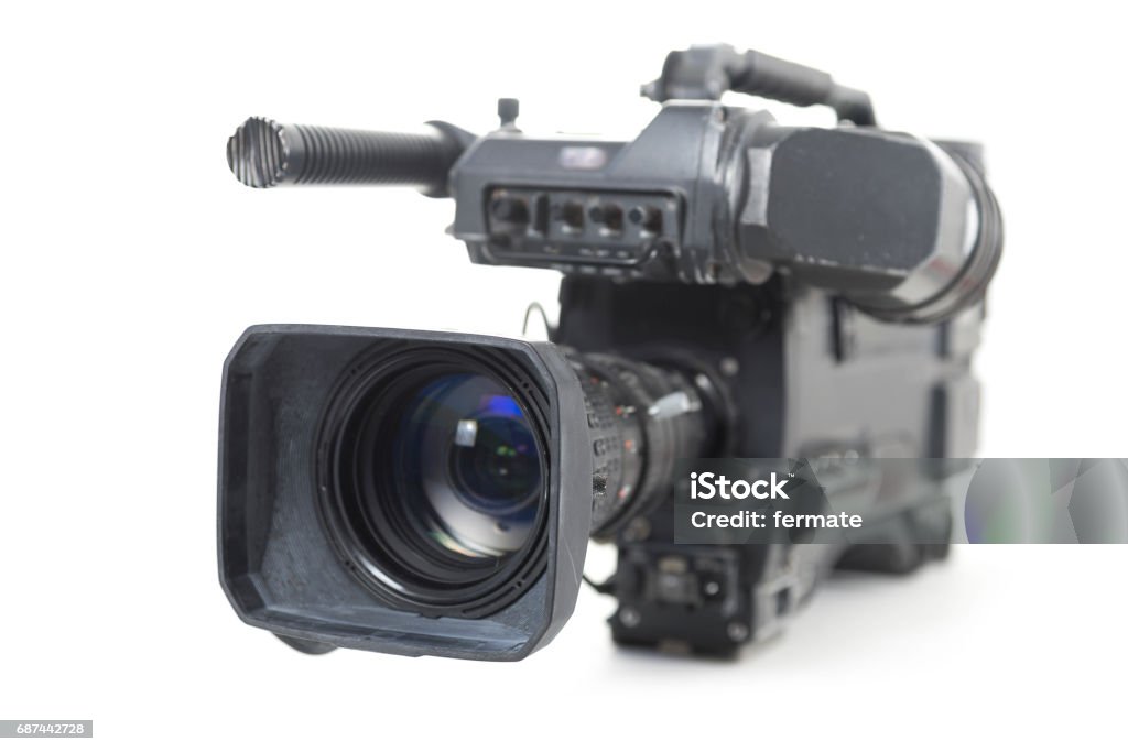 professional video camera for TV productions isolated on a white background professional video camera for TV productions isolated with shadow on a white background, selected focus, narrow depth of field Movie Camera Stock Photo