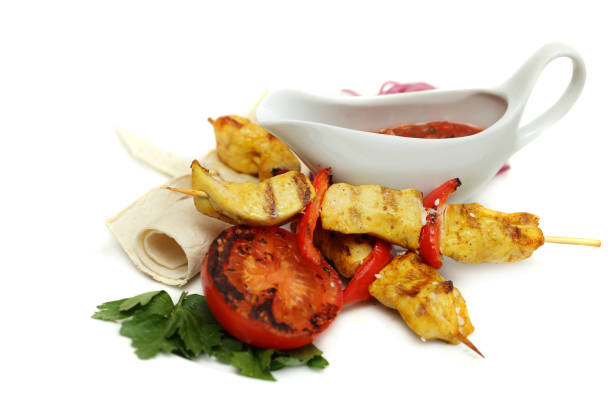 istock Barbecue sticks with chicken meat and vegetables 687450584