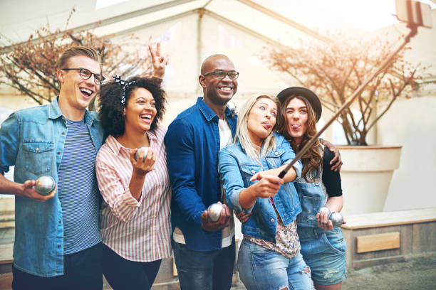 istock Happy friends taking selfie after playing Petanque 687451274