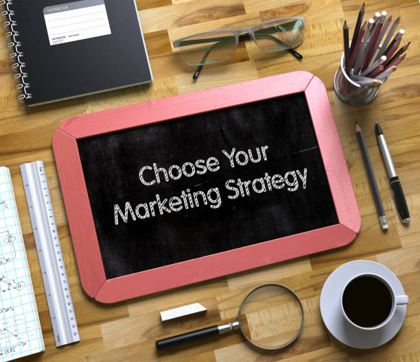 istock Choose Your Marketing Strategy on Small Chalkboard. 3D 687459330