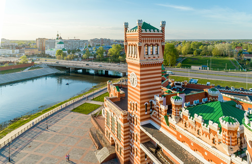 Beautiful urban view at springtime. The central areas of the city are flooded with sunshine. Russia, Yoshkar-Ola, aerial shooting in the evening time