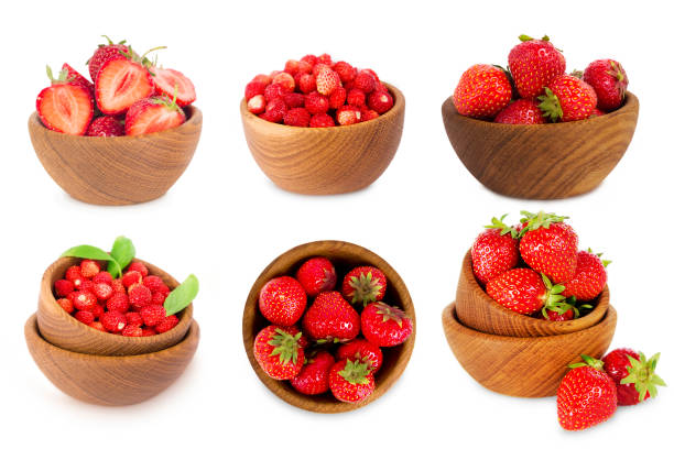 set of bowls with strawberries isolated on white background. Ripe strawberries close-up. Background berry. Collage of strawberries and wild strawberries. Sweet and juicy berry with copy space for text.
