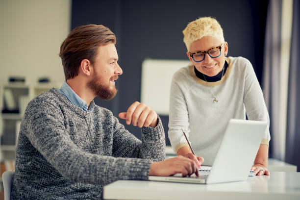 istock Business people working in modern office 687472942