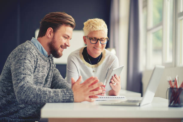 istock Business people working in modern office 687472996