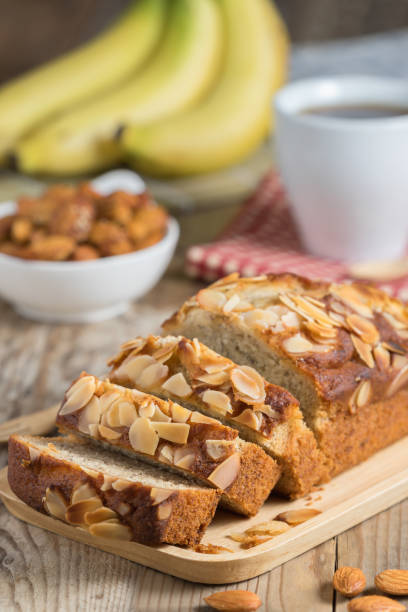 istock Banana cake topping with almond slice. Selective focus. 687479558