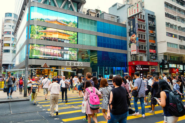 istock Busy pedestrian crossing at Mong kok Hong Kong 687480038