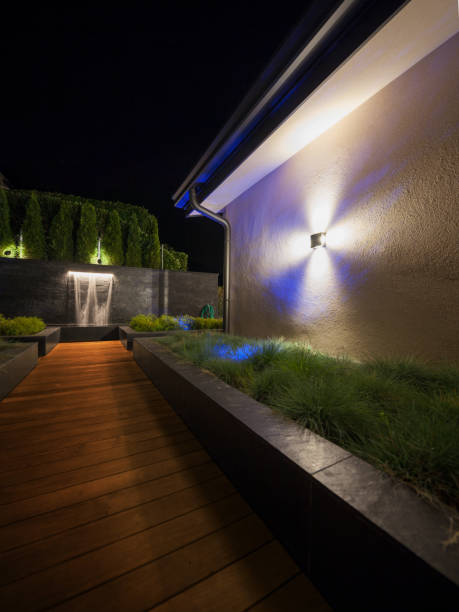 istock luxury garden with a fountain at night 687480046