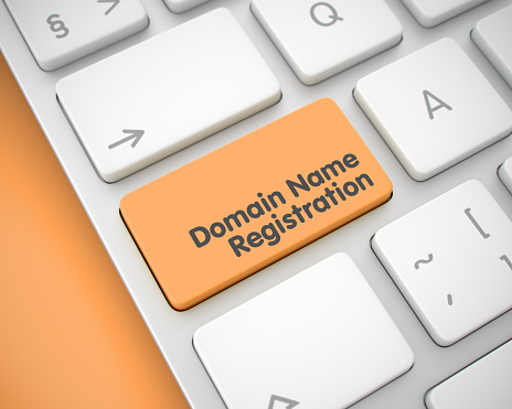 Business Concept: Domain Name Registration on Computer Keyboard lying on Orange Background. Computer Keyboard with Domain Name Registration Orange Button. 3D Render.