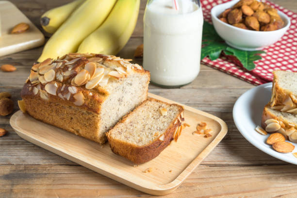 istock Banana cake topping with almond slice. 687482694