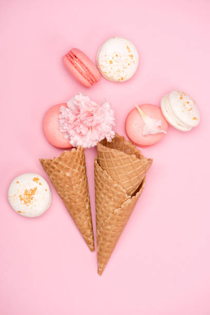 istock fresh macarons with waffle cones and Carnation flower 687482786