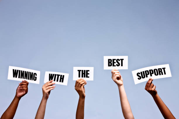 istock Hand-held signs say 