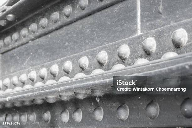 Close Up Riveted Steel Of The Bridge Stock Photo - Download Image Now - Aluminum, Architectural Column, Black Color