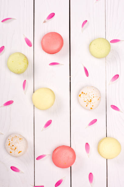 istock various of fresh handmade macarons with pink petals 687490862