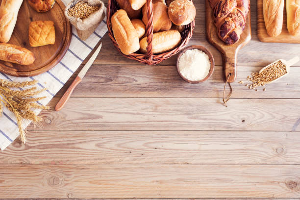 istock Freshly baked bread on wooden table 687492830