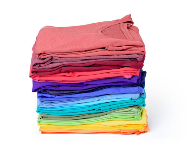 istock Stack of colorful t-shirt isolated on white background. File contains a path to isolation. 687497930